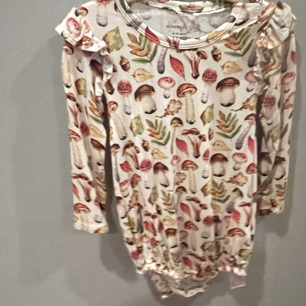 Long sleeve mushroom dress romper.